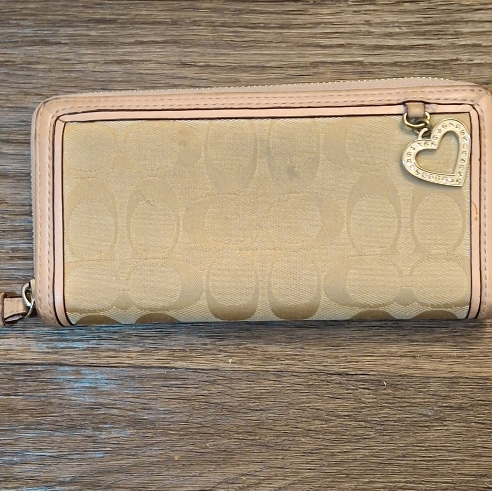 Coach Accordion Zip Wallet with Dangling Heart Charm in Signature Jacquard.